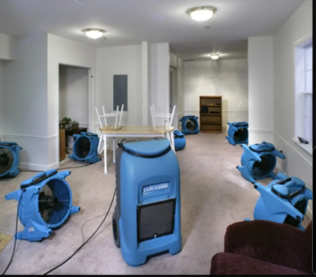 Air movers and dehumidifier setup for Water Damage Restoration in Millcreek