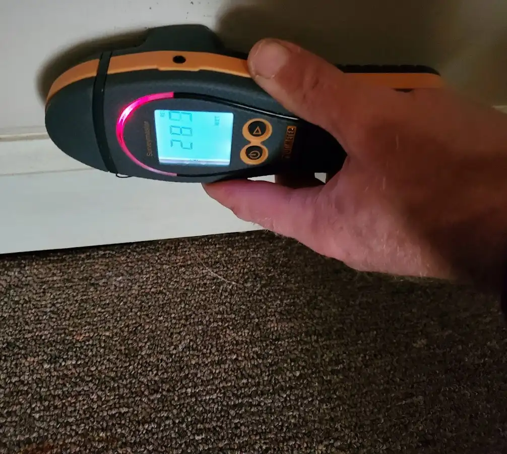 Moisture detection at baseboard during Burst Pipe Cleanup in Millcreek